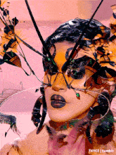 a close up of a woman 's face with insects painted on her face and the words t4yce tumblr below her