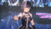 a girl in a black dress is standing on a stage in front of a castle .