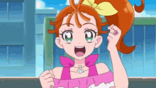 a cartoon girl with red hair and green eyes is wearing a pink top and a pink bow .