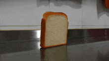 a sniper aiming at a slice of bread