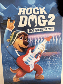a poster for rock dog 2 rock around the park with a dog holding a guitar