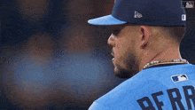 a baseball player wearing a blue jersey that says berrio on the back