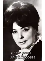 a black and white photo of a woman with the date 21.12.5-13.10.13 on the bottom