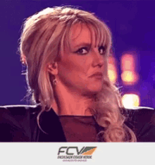 a picture of a blonde woman with a fcv logo in the corner