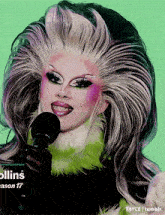 a drag queen is holding a microphone in front of her face