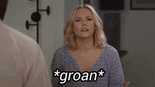 a woman is saying i 'm so tired next to a man .