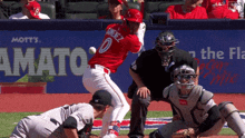 a baseball player named gonzalez is swinging at a ball
