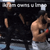 a man in a boxing ring with the words ikram owns u imao on the bottom