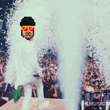 a pixel art of a man on a stage with the words apple music written on the bottom