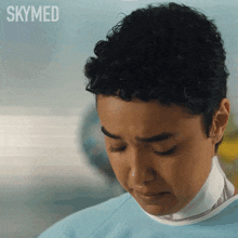 a close up of a woman 's face with the words skymed on the bottom