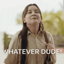a woman with long hair is holding a purse and says whatever dude .