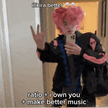 a person with pink hair taking a selfie with the caption illkira better ratio i own you make better music
