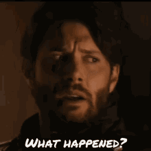 a close up of a man 's face with the words `` what happened '' written on the bottom .