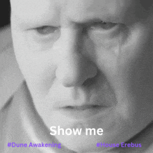 a close up of a man 's face with the words show me on the bottom