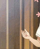 a girl with pink flowers in her hair is reaching out towards someone