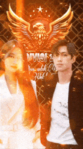 a man and woman standing in front of a sign that says divisi