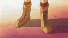 a close up of a person wearing a pair of boots