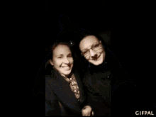 a picture of a witch and a pumpkin with a gifpal watermark