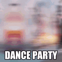 a blurred image of a dance party with a blurry background