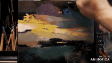 a painting is being painted on a canvas with the words made in animotica on the bottom