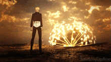 a man in a suit stands in front of a fireball with the words motherfucking king of heroes on the bottom right