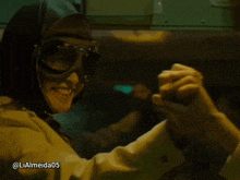 a person is holding another person 's hand with the username lialmeida05