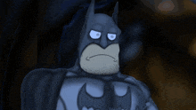 a cartoon of batman with the words look at this