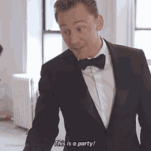 a man in a suit says this is a party