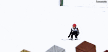 a person wearing a red helmet and goggles has the number 38 on their jersey