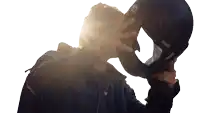 a man wearing a motorcycle helmet with the letter c on it