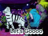 a mascot in a zebra costume says let 's goooo
