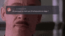 a close up of a man 's face with a message that says eh