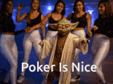 a group of women are standing around a yoda costume that says poker is nice on the bottom