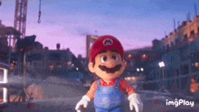 a mario doll is standing in front of a building in a video game .