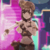 a girl in a bikini is holding a microphone in her hand .