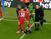 a soccer player with the number 38 on their jersey