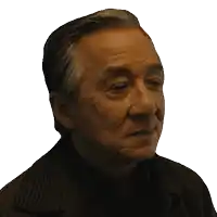 a close up of a man 's face with his eyes closed