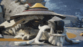 a statue of a dog with a hat on