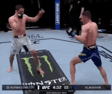 a boxing match between nurmagomedov and almakhan is underway