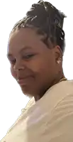 a woman with braids in her hair is smiling and wearing a white shirt