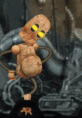 a cartoon drawing of a robot with yellow eyes and antennas