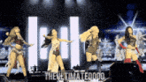 a group of women dancing on a stage with the words the ultimate dodo on the bottom right