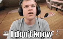 a man wearing headphones says " i don 't know "