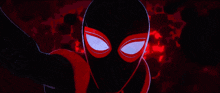 a close up of a cartoon character 's face with glowing eyes against a red background .