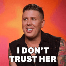 a man with a tattoo on his arm says i do n't trust her