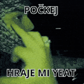 a picture of a man with a bandana on his head and the words " pockej hraje mi yeat " on the bottom