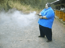 Fat Guy Shooting GIF - Fat Guy Shooting Gun GIFs