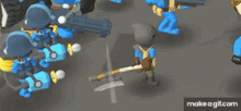 a group of soldiers are playing a video game and one of them is holding a light beam