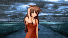 a girl with a cat ear standing in the rain
