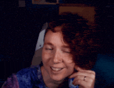a woman with red hair says it 's me in yellow letters